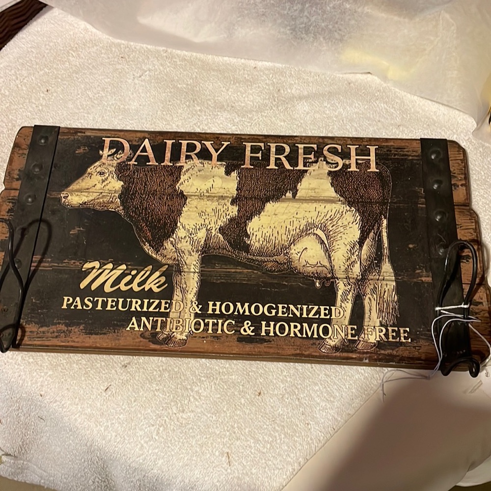 Rustic sign with hooks
